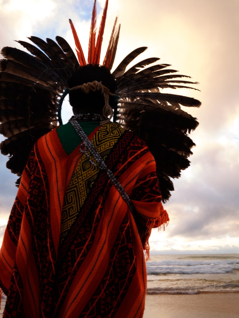 Ninawa Pai da Mata, Huni Kuin, watching the sunrise in Bahia. Photo by Laura Dev.